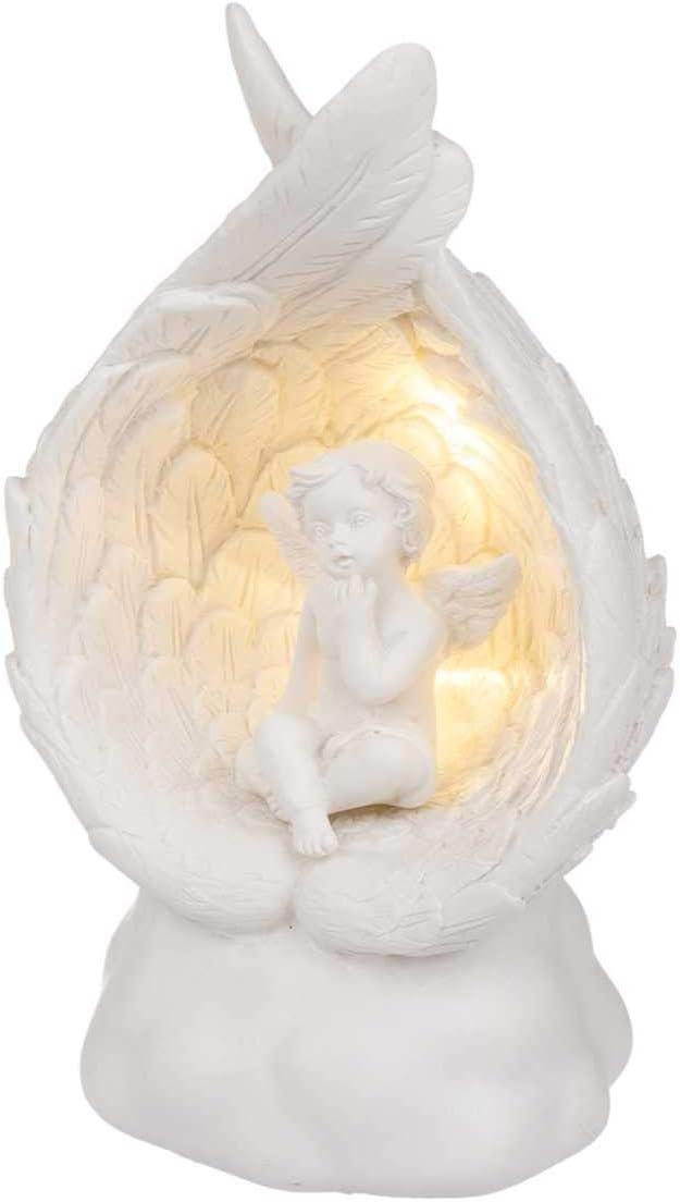 Out of the blue LED Decorative Figurine Sitting Angel Random Selection of 4 Similar Motifs Angel Figurine Putte Decorative Angel Light Decoration Dimensions (H x W x D): 12 x 7 x 5.5 cm, White
